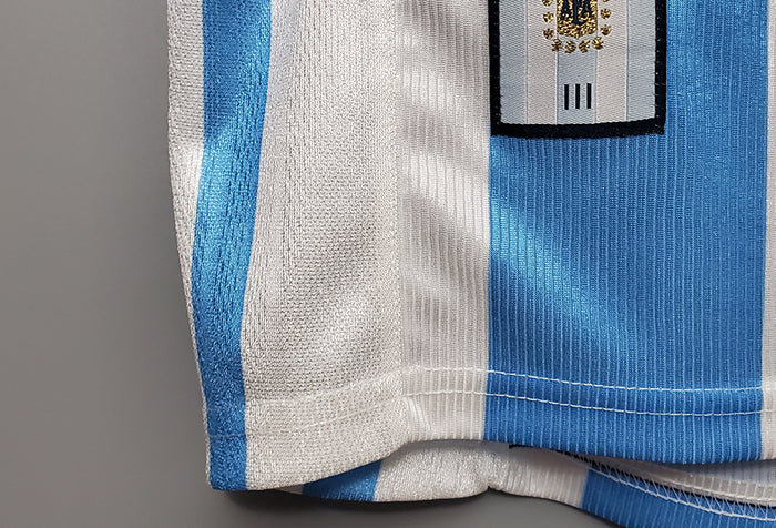 Close-up of Retro Argentina 1998 jersey showcasing detailed fabric and iconic stripes
