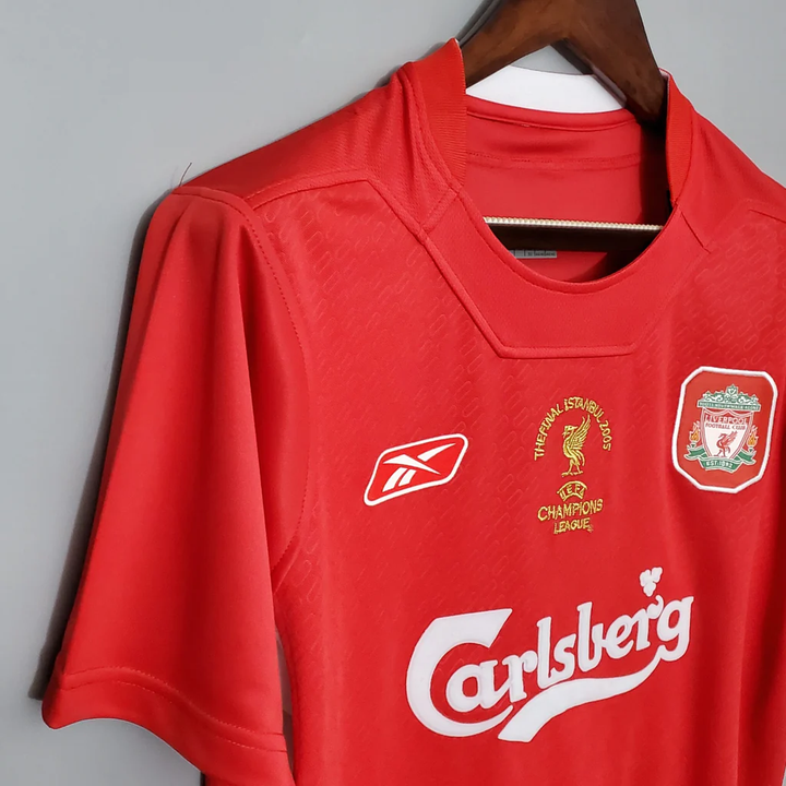 Retro Liverpool 2005 jersey in red featuring Carlsberg logo and Champions League details