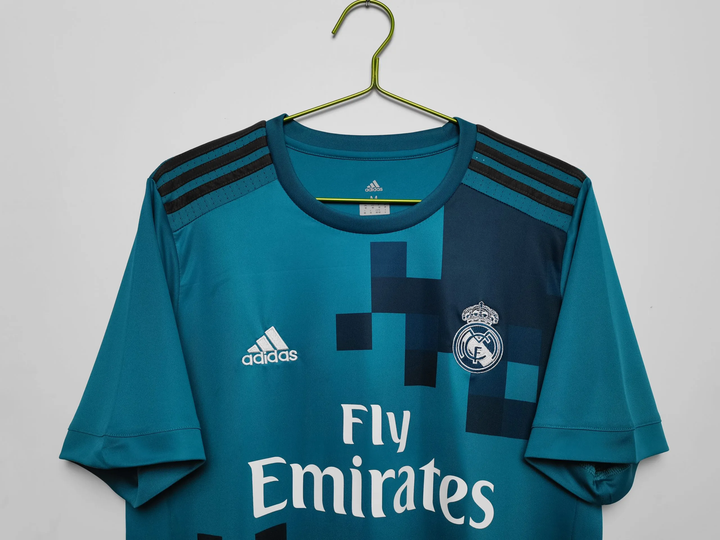 Retro Real Madrid 2017-18 jersey in teal with black accents and Adidas logo