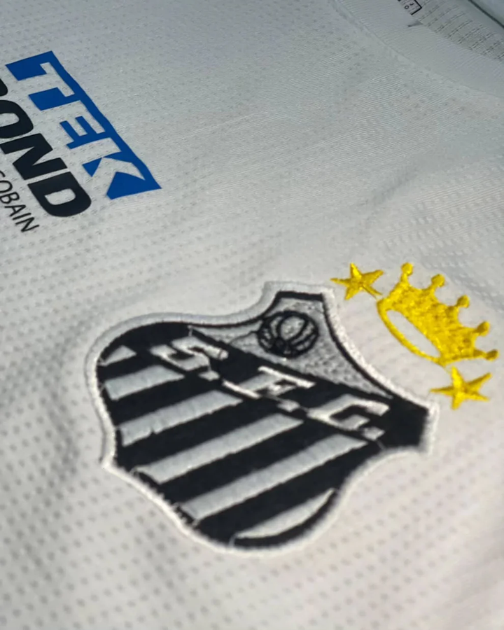 Close-up of Santos home jersey 2025-26 featuring embroidered logo and detailed design